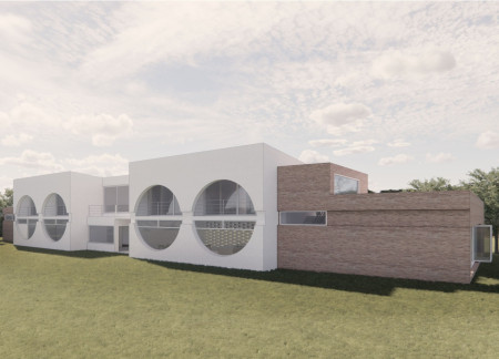 Integration of Red Brick and White Stucco in a Culturally Rich Guesthouse Design