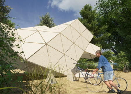 Triangular Plywood Structure Merging Reading Space With Forest Wilderness