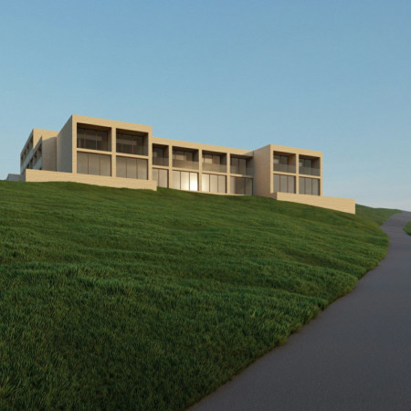 Senior Living Community Featuring Rammed Earth and Expansive Glass Facades
