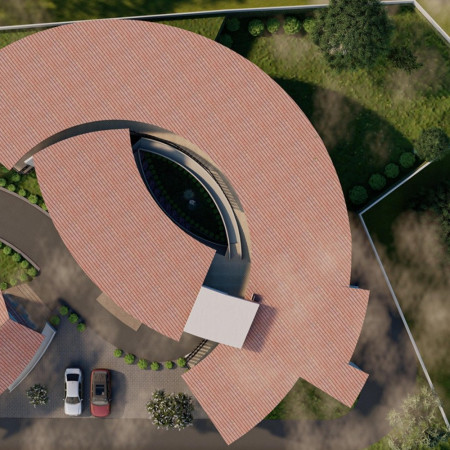 Curvilinear Design Featuring Hand-Plastered Gypsum and Natural Stone in a Community-Centric Residence