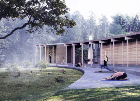 Rammed Earth Retreat Featuring High Windows and Natural Stone Integration for Mindful Practices
