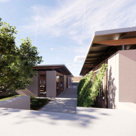 Rammed Earth and Ventilated Roofs in a Sustainable Desert Home  