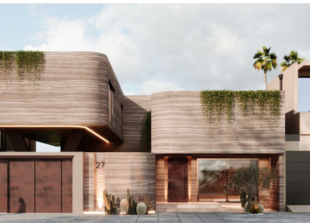Charred Wooden Shingles and Reclaimed Materials Shape Multifunctional Community Space  