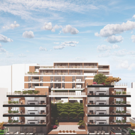 Charred Wooden Shingles and Cross-Laminated Timber Panels Shape a Multifunctional Community Space  