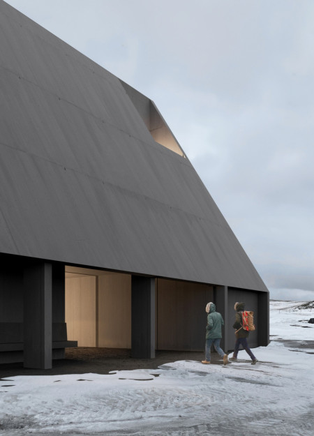 Charred Wood Shingles and Expansive Glass Create a Seamless Integration with Nature in a Community Hub  