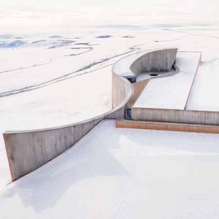 Charred Wooden Shingles and Rammed Earth Create a Community Hub with Sustainable Solutions