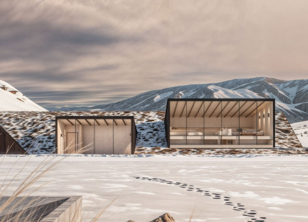 Cedar Cladding and Natural Stone Define a Sustainable Retreat in the Desert Landscape  