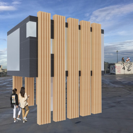 Charred Wooden Shingles Forming a Community Space Adorned With Reclaimed Timber and Expansive Natural Light