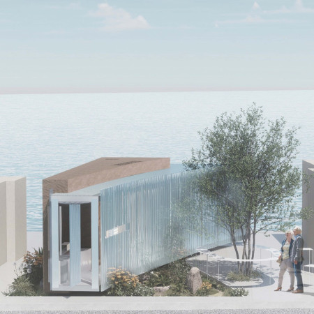 Charred Wooden Shingles and Natural Stone Create Community Space with Sustainable Design  