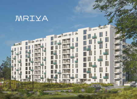 Modular Concrete Panels Enhanced by Vertical Landscaping in a Community-Focused Residential Building