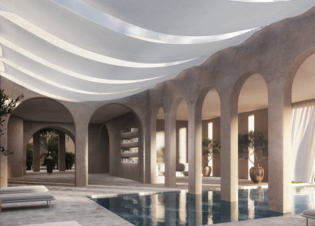 Residential community integrating local stone and palm wood in a desert environment