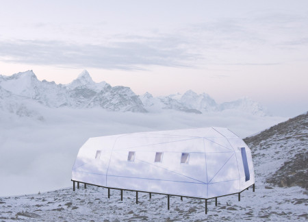 Reflective Stainless Steel Hut Elevated Above Permafrost with Natural Insulation and Modular Design  