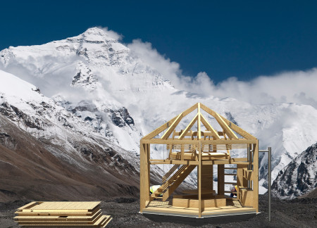Sustainable home featuring cross-laminated timber and charred wood shingles in an alpine setting  