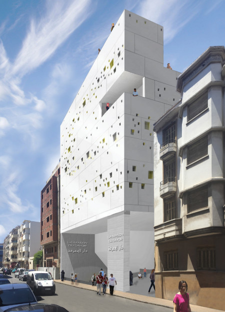 Community Learning Center with White Corian Facade and Central Courtyard  