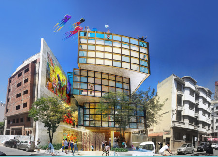Library with a Cantilevered Design Featuring Exposed Aggregate Concrete and a Rooftop Garden  