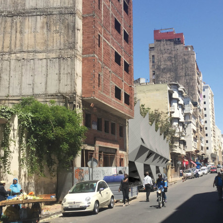 Memory-Infused Space With Concrete Skin and Transparent Facades for Community Engagement