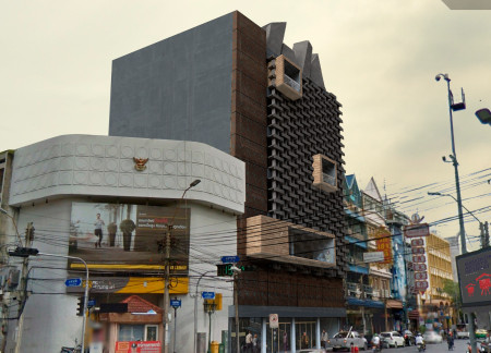 Panoramic Deck Nestled Among Raw Concrete and Timber Cladding in Bangkok’s Creative Hub