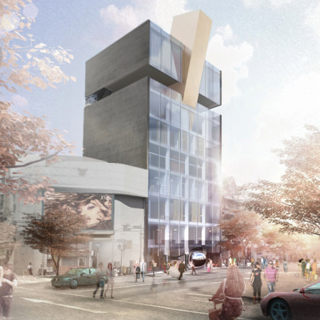 Charred Wood Shingles and Green Terraces Create a Sustainable Arts Center in an Urban Context