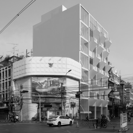 Lattice-Structured Gallery Showcasing Glass Facades and Reinforced Concrete in Urban Creative Retreat  
