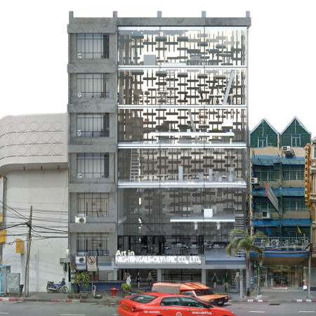 Perforated Metal Façade and Reinforced Concrete Structure in a Community-Centric Space