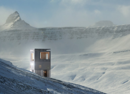 Reflective Aluminum Shelter Embracing Panoramic Views In The Icelandic Wilderness
