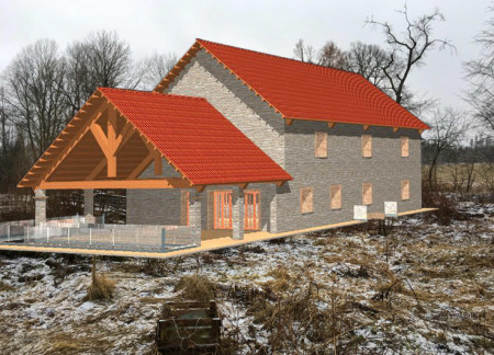Charred Wooden Shingles and Natural Stone Elevate Historical Barn Into a Community Wellness Hub