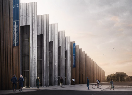 Jagged Polycarbonate Facade Complementing Glulam Structure in a Versatile Multi-Purpose Auditorium