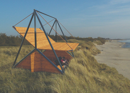 Coastal retreat featuring cross-laminated timber panels and charred wood shingles for enhanced sustainability and connection to nature