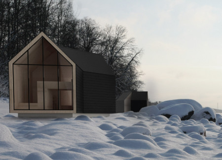 Charred Wooden Shingles and Blackened Timber Create Cohesive Retreat in Serene Landscape