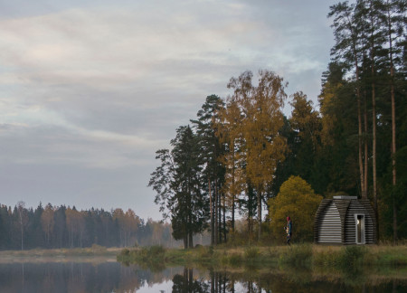 Sustainable Retreat Featuring Pine Timber Construction and Recyclable Aluminum Elements