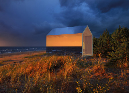 Reflective Aluminum Cabins Merging Timber Warmth with Coastal Serenity