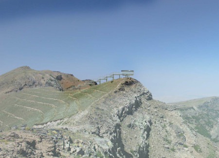 Circular Viewing Platform with Clear Glass and Aluminum Structure Overlooking Volcanic Landscape