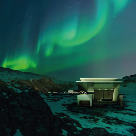 Curvilinear Retreat Crafted With Titanium Cladding and Reclaimed Wood For Northern Lights Viewing