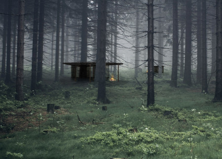 Circular Cabins with Thatched Roofs in a Forest Sanctuary Using Local Timber