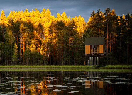Charred Wood Cladding and Translucent Panels Shape a Modular Eco-Resort Offering Nature-Centric Accommodation