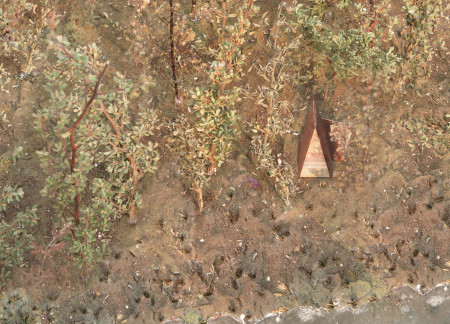 Triangular Retreat Crafted from Cross-Laminated Timber and Reclaimed Wood in a Forest Setting