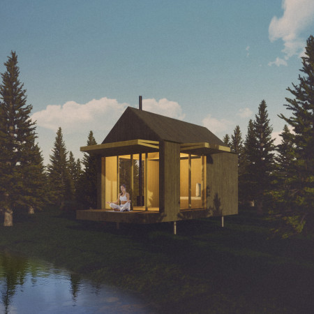 Residential retreat featuring locally sourced timber and a rainwater harvesting system in a forested landscape