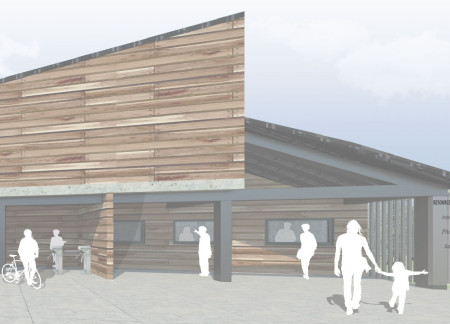 Charred Wooden Shingles and Expansive Glass Facades Enhancing Visitor Experience in a Natural Setting