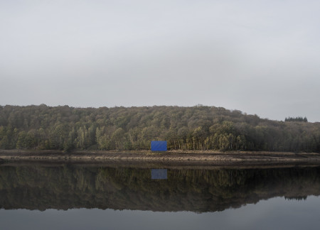Triangular Shelter Crafted From Renewable Timber and Light Gray Concrete For Meditative Reflection