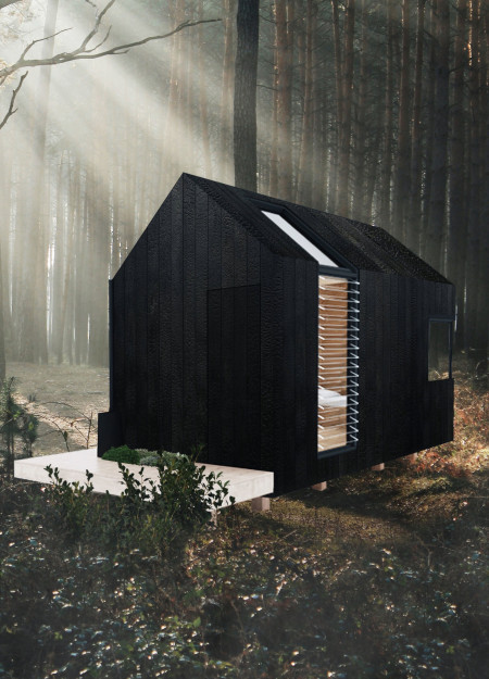 Charred Cedar Retreat Nestled in a Forest for Holistic Well-Being