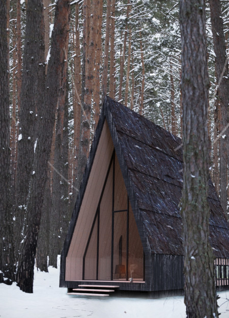 Charred Wooden Shingles and Laminated Wood Structure Define a Tranquil Meditation Retreat in Latvian Forest