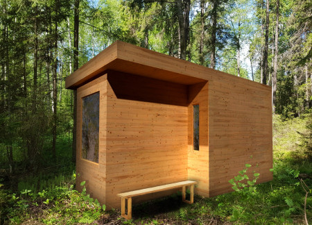 Recycled Cellulose Insulation in a Nature-Integrated Cabin With Expansive Pine Windows  