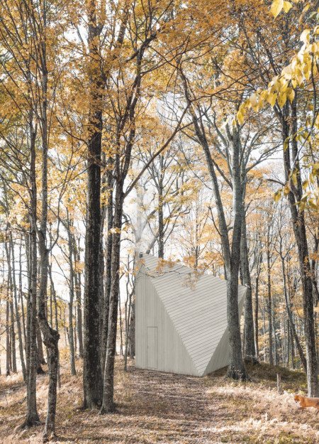 Cross-Laminated Timber Retreat Nestled Among Tranquil Waters With Charred Wooden Shingles
