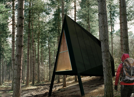 Charred Wooden Shingles Enveloping A Tranquil Meditation Retreat in the Forest  