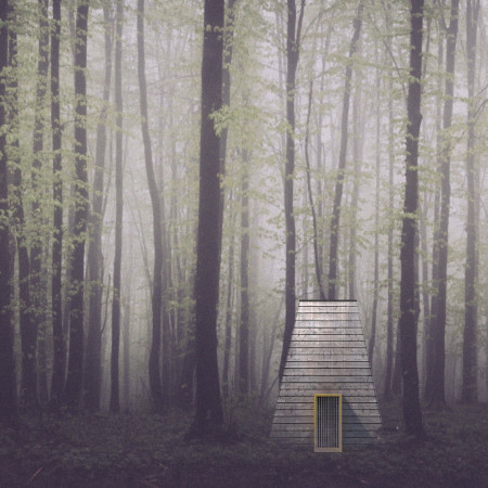 Tapered Retreat Crafted From Local Timber With Charred Wooden Shingles Embracing Nature's Essence