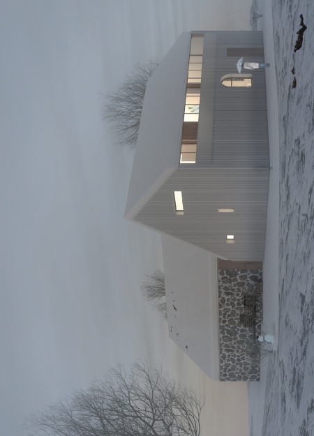 Guest House Emphasizing Sustainability with Charred Wooden Shingles and Cross-Laminated Timber Panels