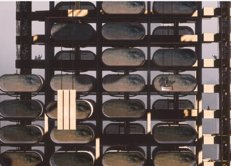 Charred Wooden Shingles and Steel Framework in Adaptable Urban Housing Solutions
