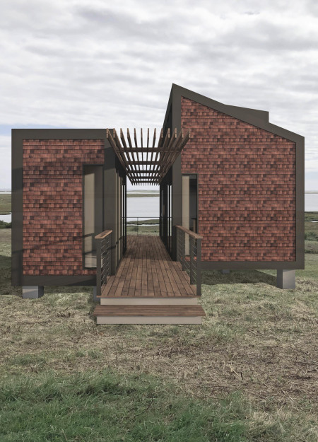Affordable housing emphasizing modular design with charred wooden shingles and sustainable materials in a coastal setting