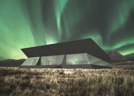 Educational facility featuring cross-laminated timber and charred wood shingles set in a volcanic landscape