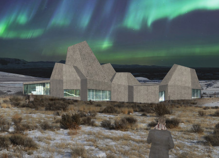 Hexagonal Structures of Concrete and Glass Embracing Iceland's Volcanic Landscape